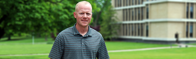 Headshot of NJM employee Chuck.