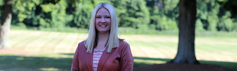 Outdoor headshot of NJM employee, Liz.
