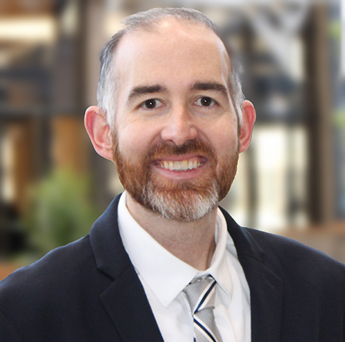 Headshot of employee Kevin.