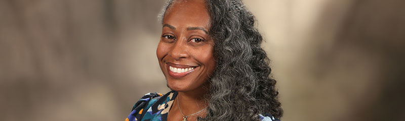 Headshot of NJM employee Shelli.